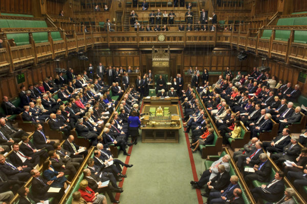 A picture of MPs sitting in the Houses of Parliement where they are currently debating legislation on The Troubles.