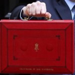 Mutual militarisation. Chancellor holding his red case. Increased defence spending promises in the 2023 Spring Budget.